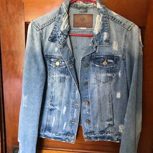 Distressed jean jacket with embroidery